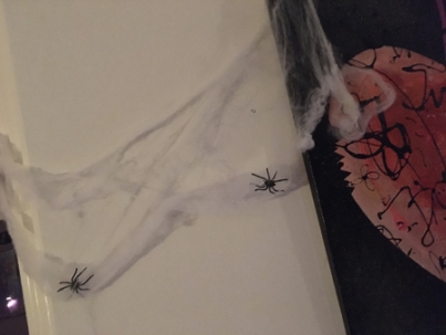 Spindelväv och spindlar på tavla