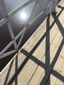 Bro och sol i Fyrisån